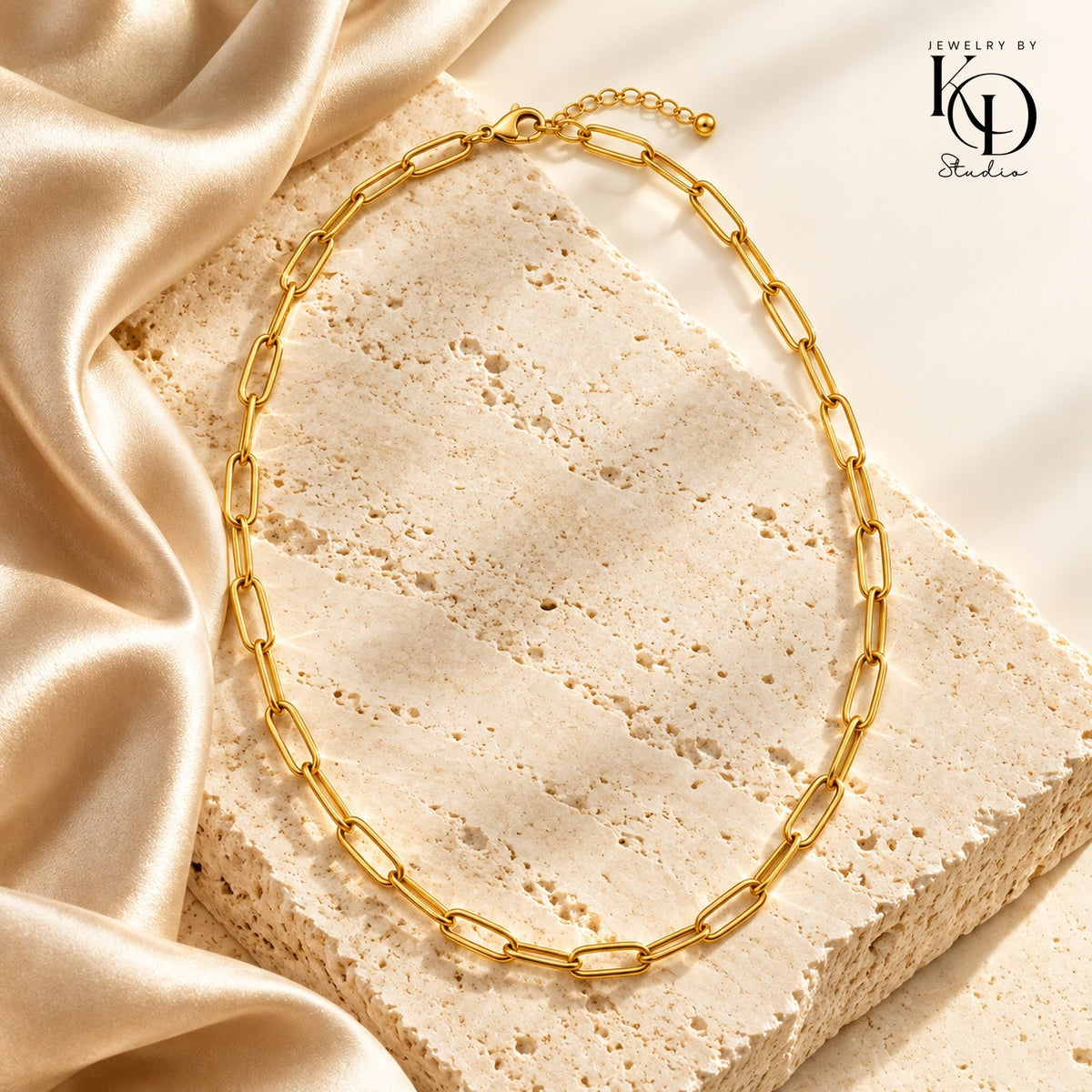 Everyday Chic gold paperclip necklace on champagne silk and ivory stone, approved stacked KD Studio logo