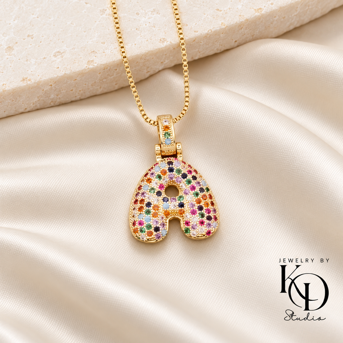 Puffy Rainbow Initial Necklace — A gold