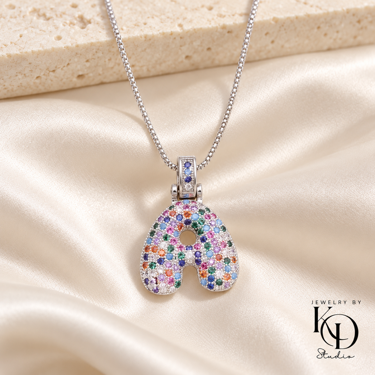 Puffy Rainbow Initial Necklace — A silver