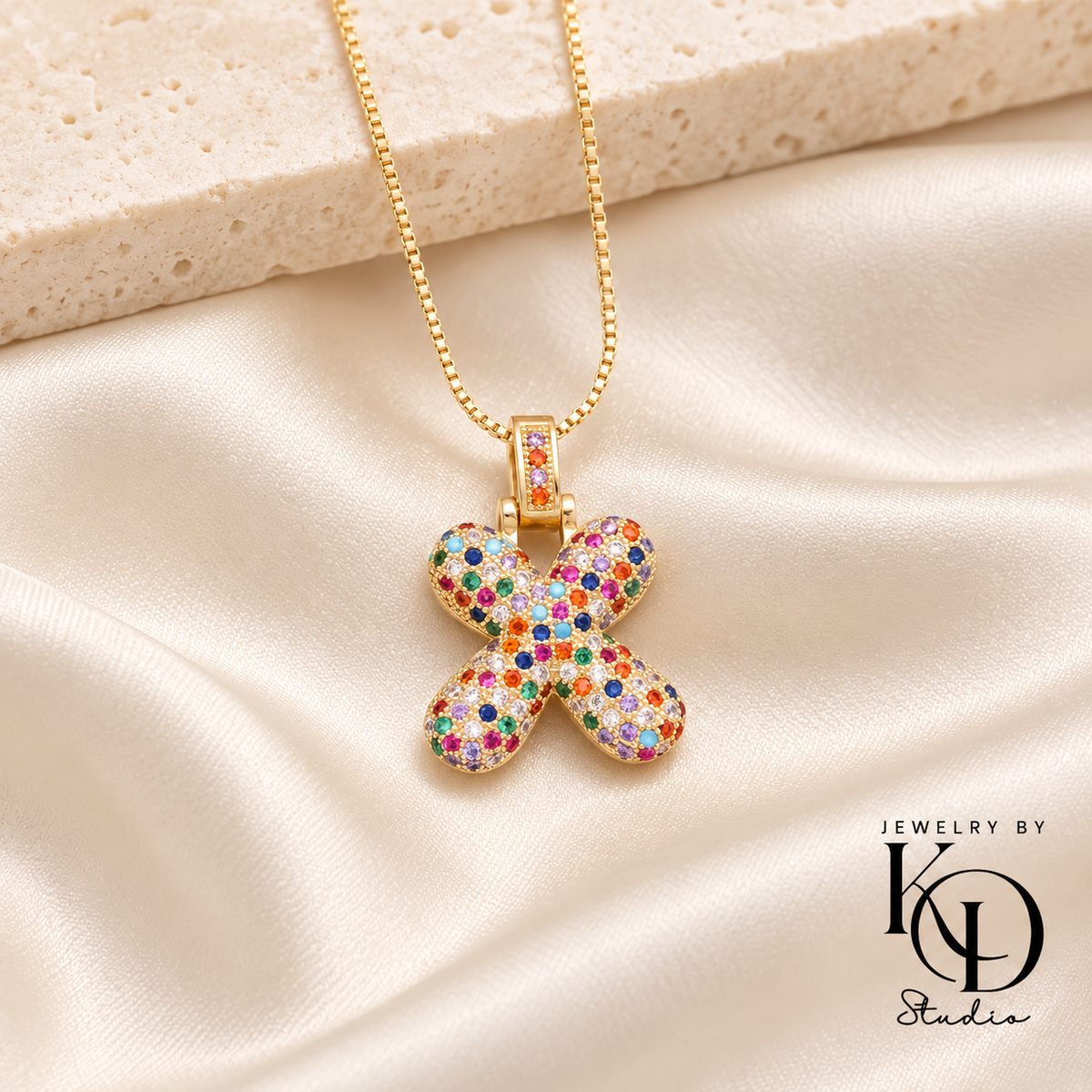 Puffy Rainbow Initial Necklace — X gold
