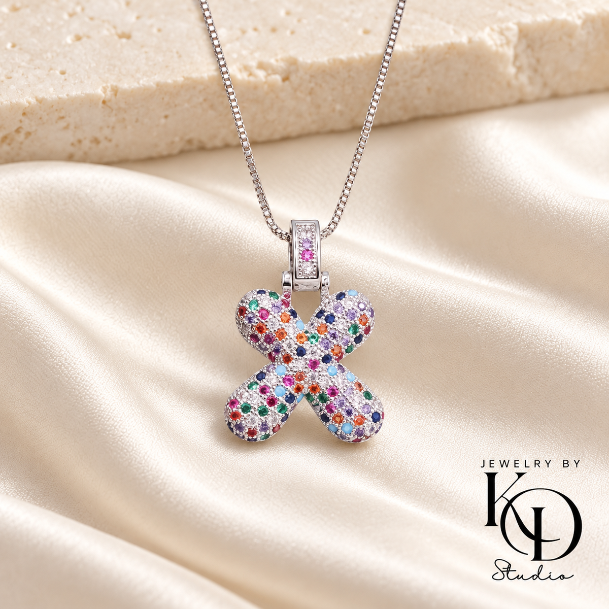 Puffy Rainbow Initial Necklace — X silver