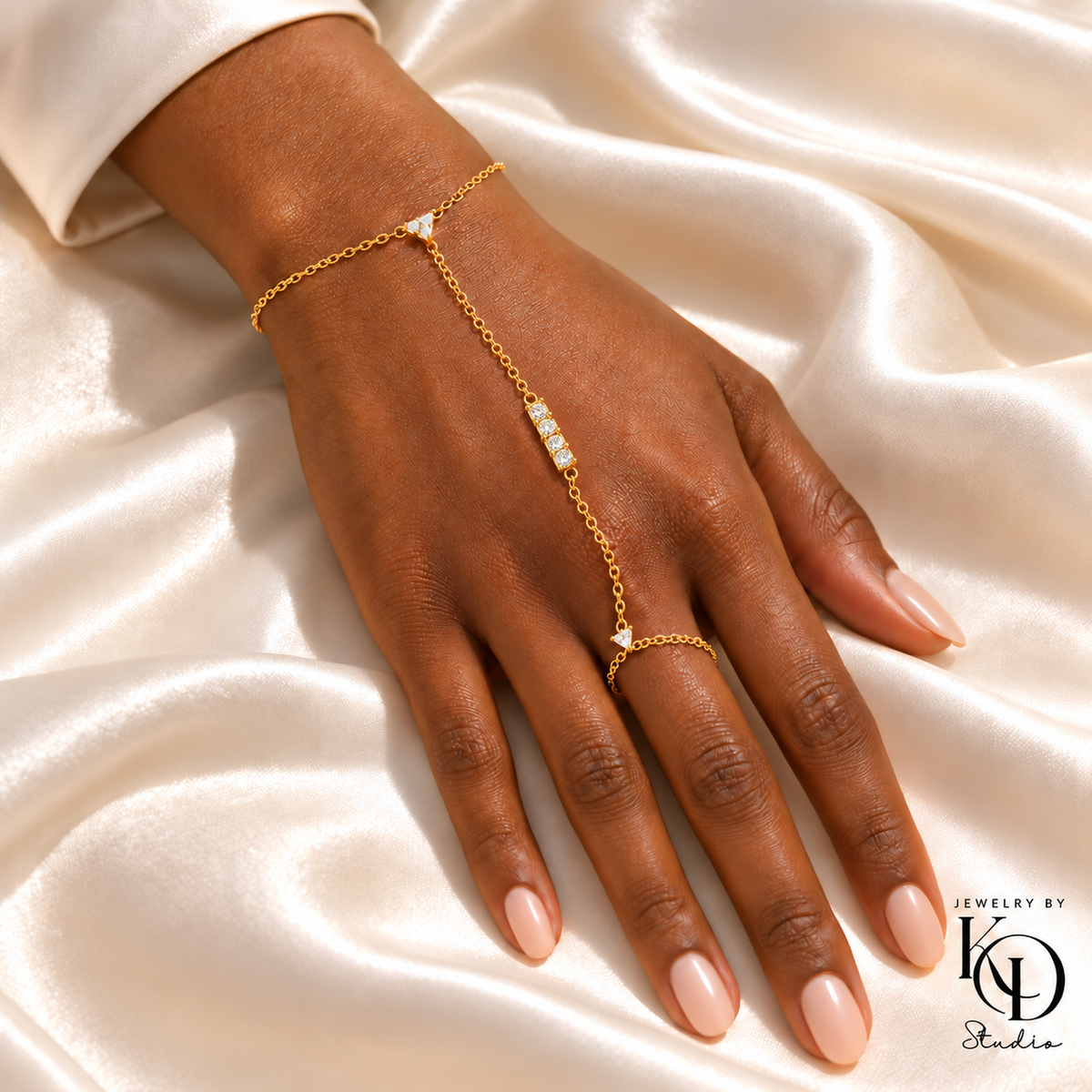 Rich Vibes Hand Chain with four CZs in a joined gold setting