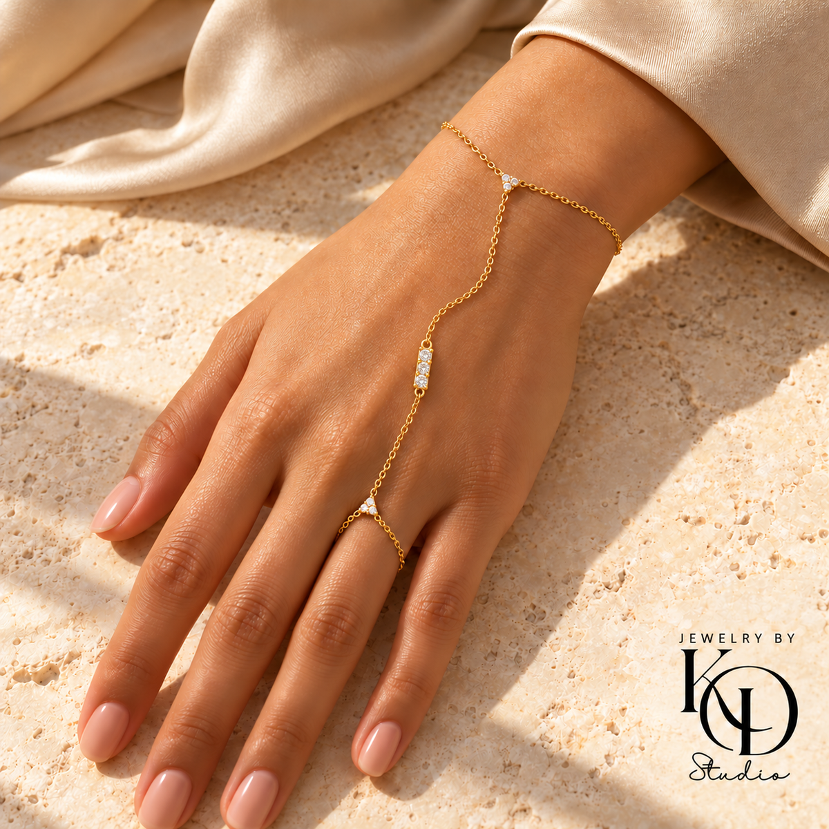 Rich Vibes Hand Chain with four CZs in a joined gold setting